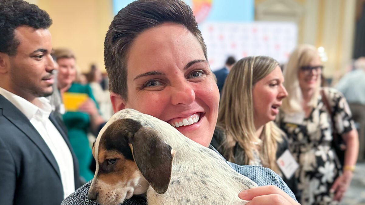 Katie Campbell holding a puppy at Pet Night on Capitol Hill in Washington, D.C.