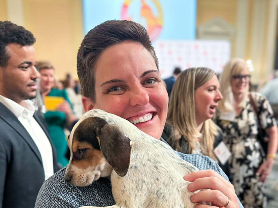 Katie Campbell holding a puppy at Pet Night on Capitol Hill in Washington, D.C.