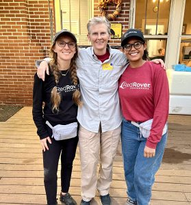 three people smiling