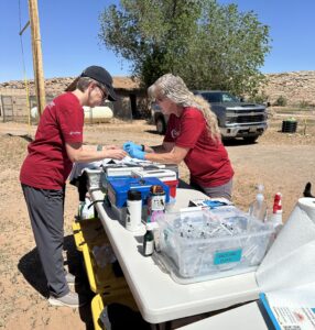 volunteers prepare veterinary treatments during a deployment with the RedRover Responders team and Underdog - Moab