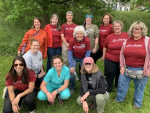 RedRover Responders Community Programs deployment - Mobile Pet Food Shelf staff pose alongside RedRover Responders volunteers