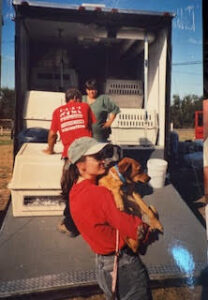RedRover Responders volunteer transports a dog at Hurricane Katrina