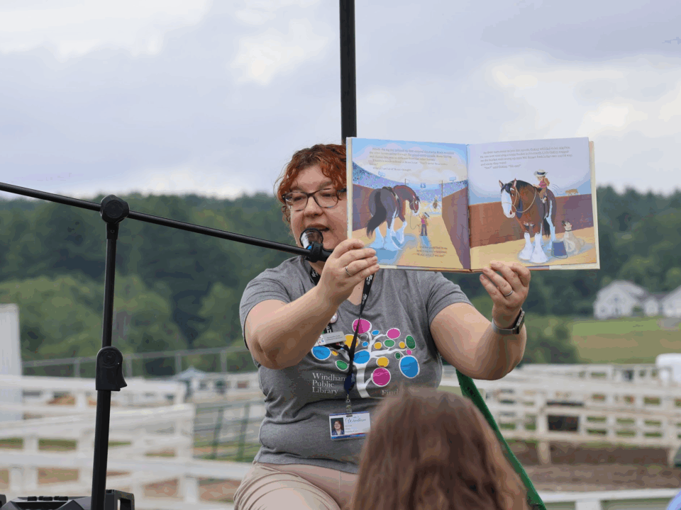 A Windham Public Library librarian reads a horse-themed story during MSSPA's Poly Tales pilot program