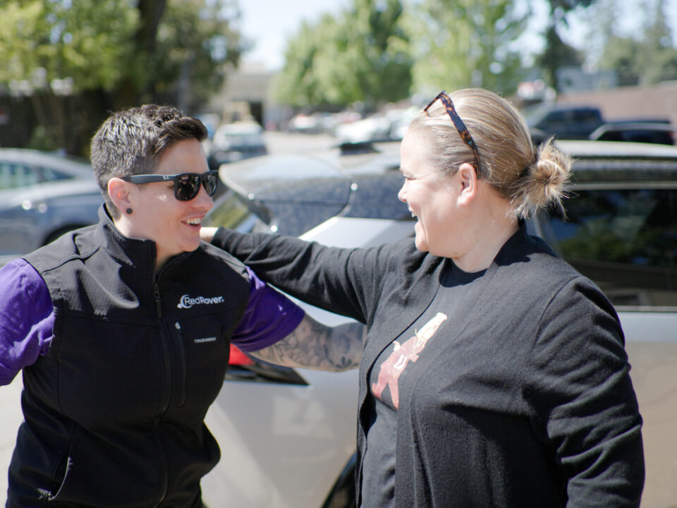 RedRover President and CEO Katie Campbell shakes hands with Director of the Living Room Center in Santa Rosa