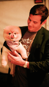 Pomeranian and RedRover Staff Mike wear matching Pets Are Family gear at the SSPCA Gala 2025