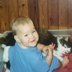 RedRover Membership and Administrative Assistant, Claire, with her childhood cats