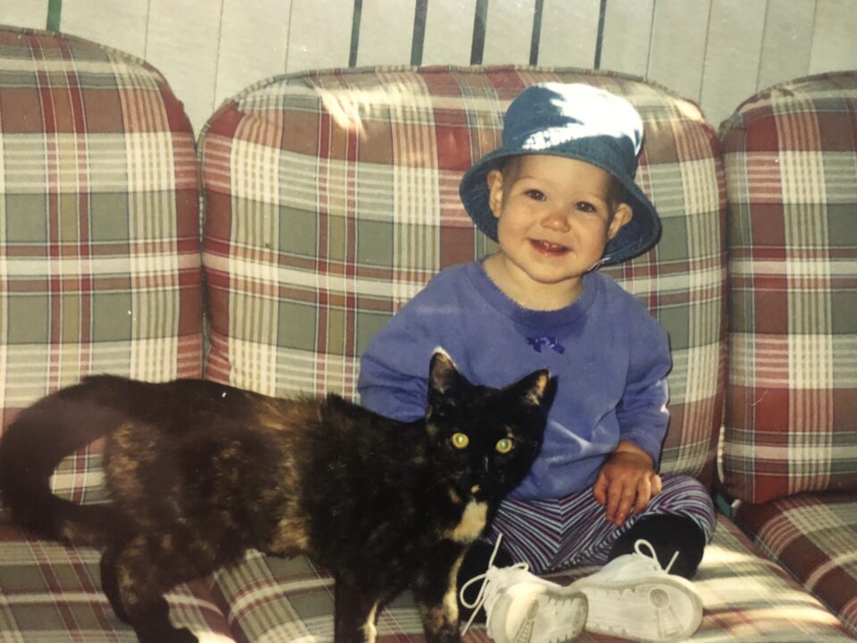 RedRover Membership and Administrative Assistant, Claire, with her childhood cats