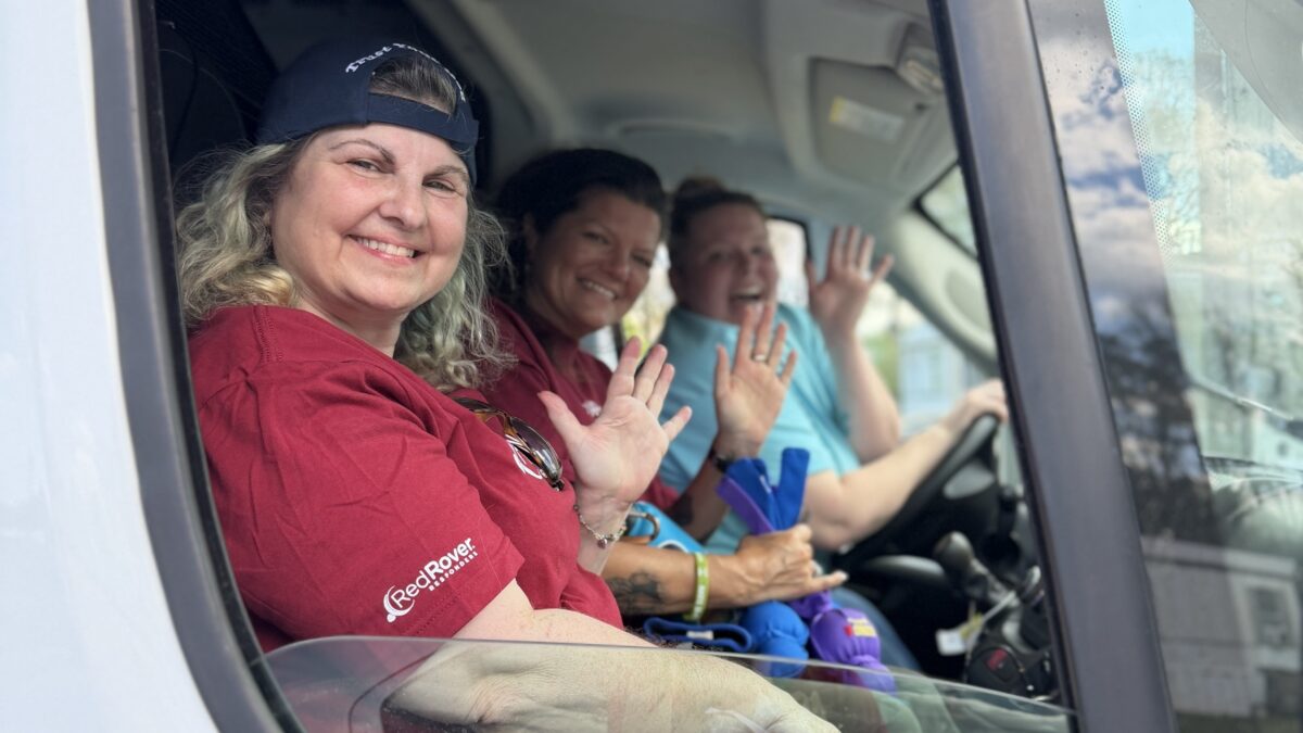 RedRover Responders volunteers wave from a truck during our Dogs Deserve Better Piedmont 2026 Deployment