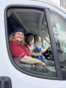 RedRover Responders volunteers wave from a truck during our Dogs Deserve Better Piedmont 2026 Deployment