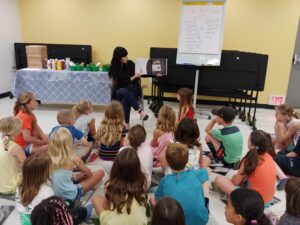 RedRover Readers staff Minhhan reads to children