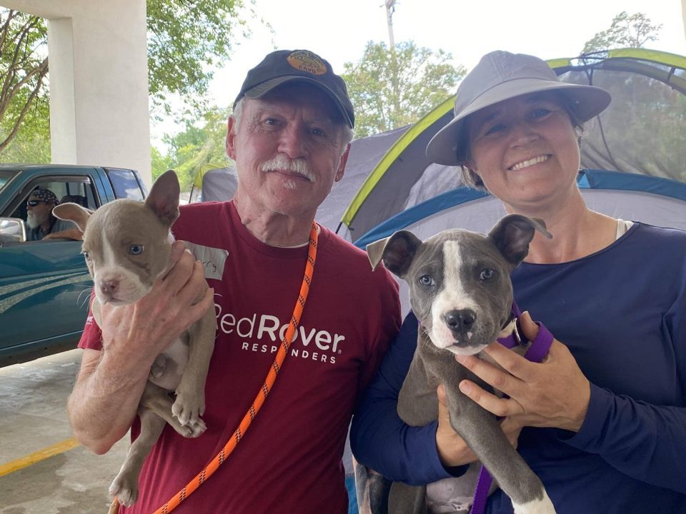 RedRover Responders volunteer Larry with a pet family in Louisiana