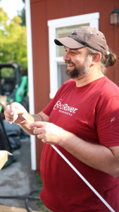 RedRover Responders volunteer prepares materials at a domestic violence shelter build