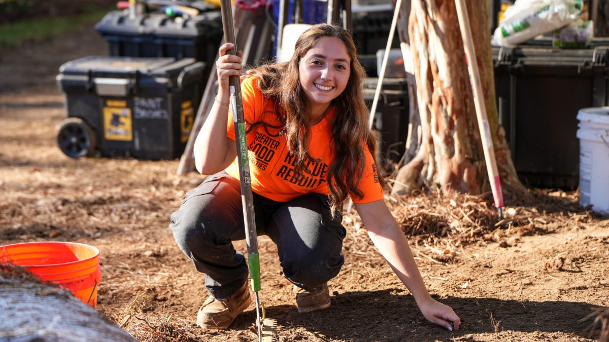 Greater Good Charities and Don't Forget the Pets Senior Program Manager Gabbie Leister at a domestic violence shelter build
