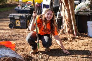 Greater Good Charities and Don't Forget the Pets Senior Program Manager Gabbie Leister at a domestic violence shelter build