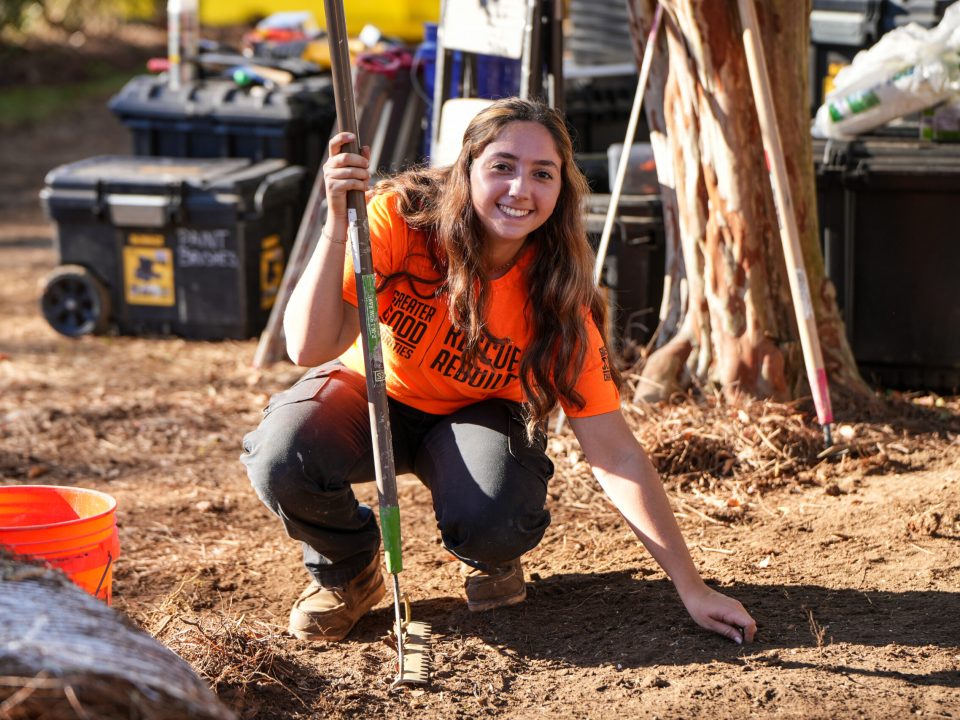 Greater Good Charities and Don't Forget the Pets Senior Program Manager Gabbie Leister at a domestic violence shelter build