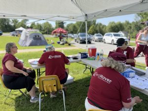 RedRover volunteers do intake for the Mobile Pet Food Shelf clinic